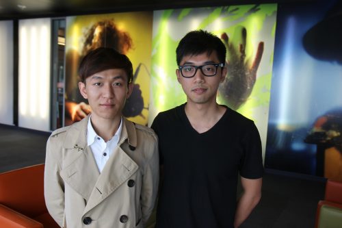 Chao Huang and Tairan Li pose together.