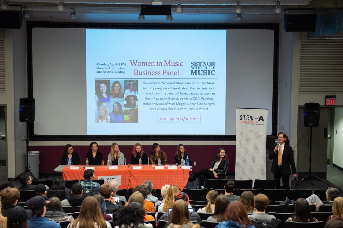 Students at a music industry panel event.