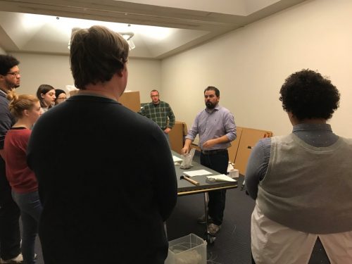 Andrew Saluti speaks to his graduate students.